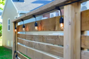 lights strung on fence in Kansas City, Jeremy Electrical