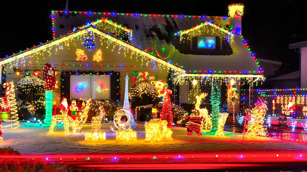 A Kansas City homeowner’s facade and lawn, decorated for the Holidays. By Jeremy Electrical. 